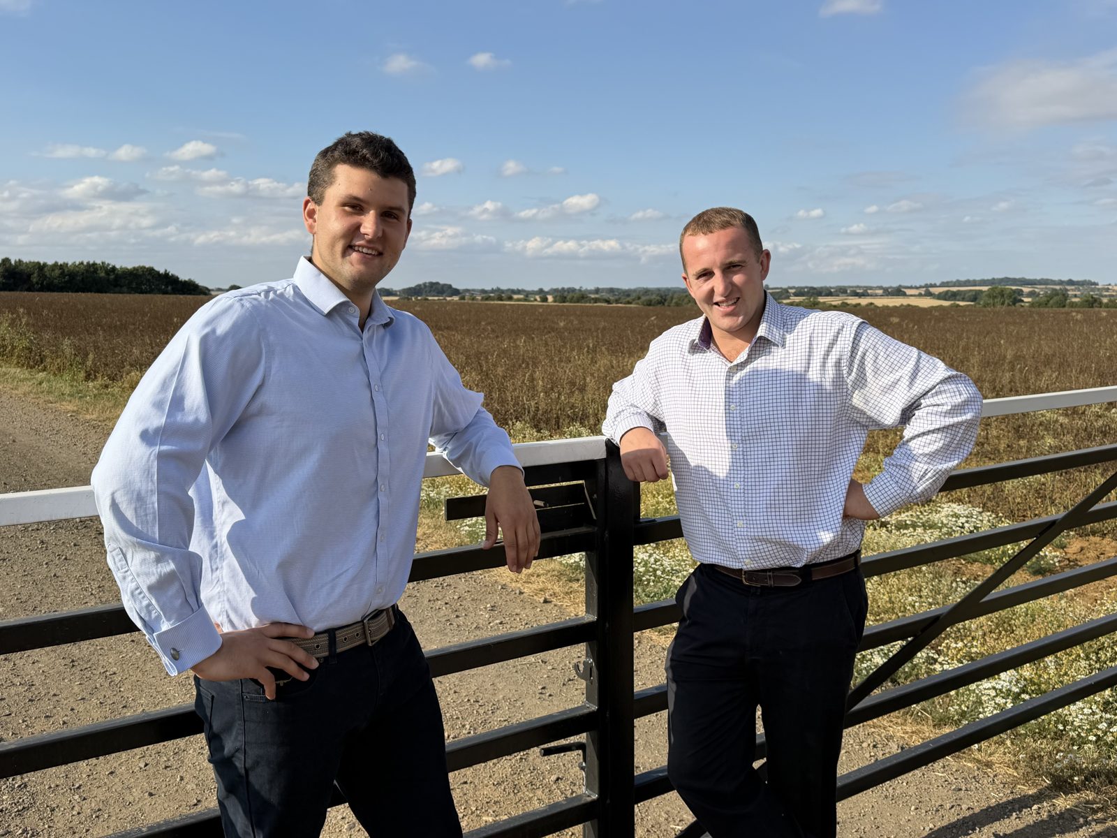 George Davies and Angus Watkin, founders of DW Ground Services, at a field gate in Rutland